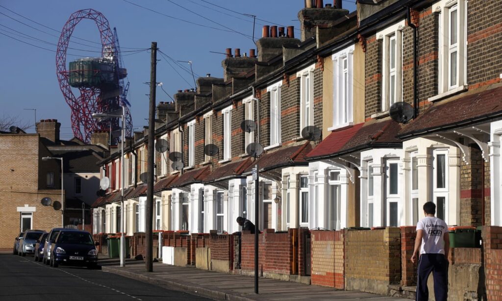 A residential street in Newham with the ArcelorMittal Orbit in the background.