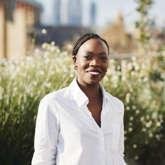 Natsayi Sithole standing in a garden