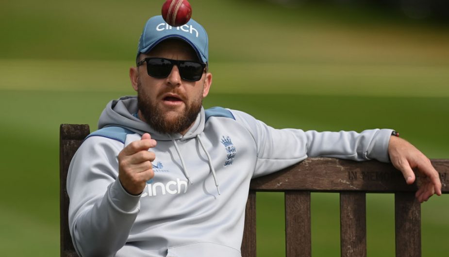 Baz Ball. A photo of Brendan McCullen tossing a cricket ball. Courtesy of Getty Images